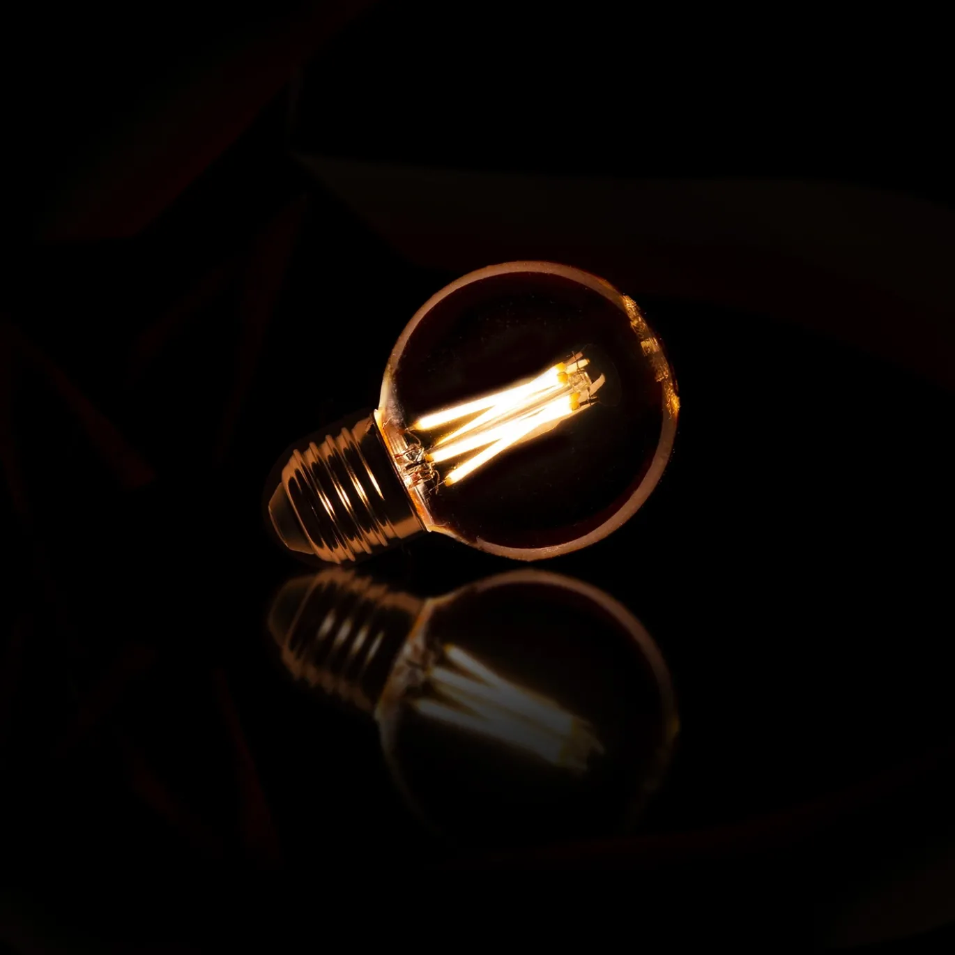 Lichtbron LED filament bol Ø6 / Amberkleurig glas