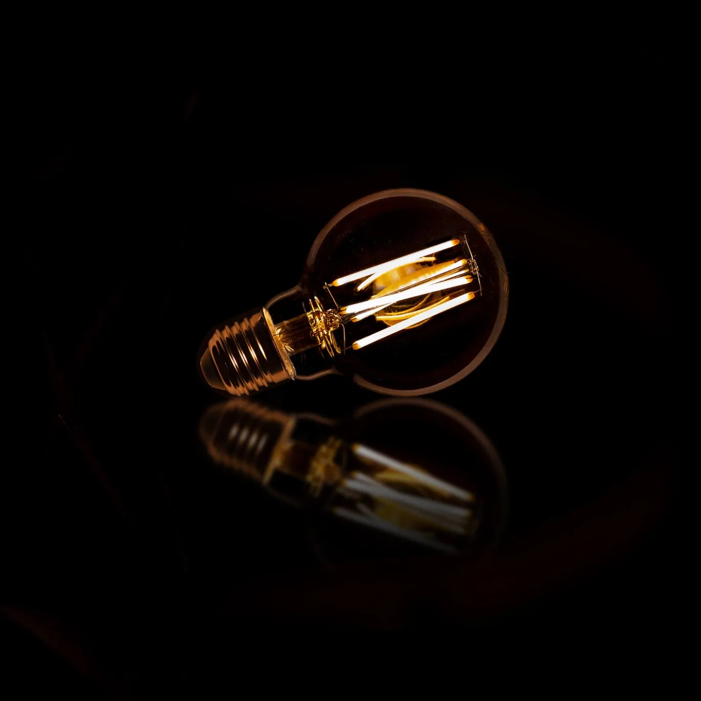 Lichtbron LED filament bol Ø7 / Amberkleurig glas