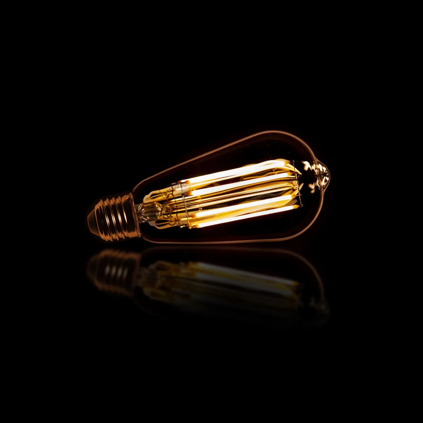 Lichtbron LED filament druppel - E27 6W 2100K 450lm dimbaar / Amberkleurig glas - Giga Meubel